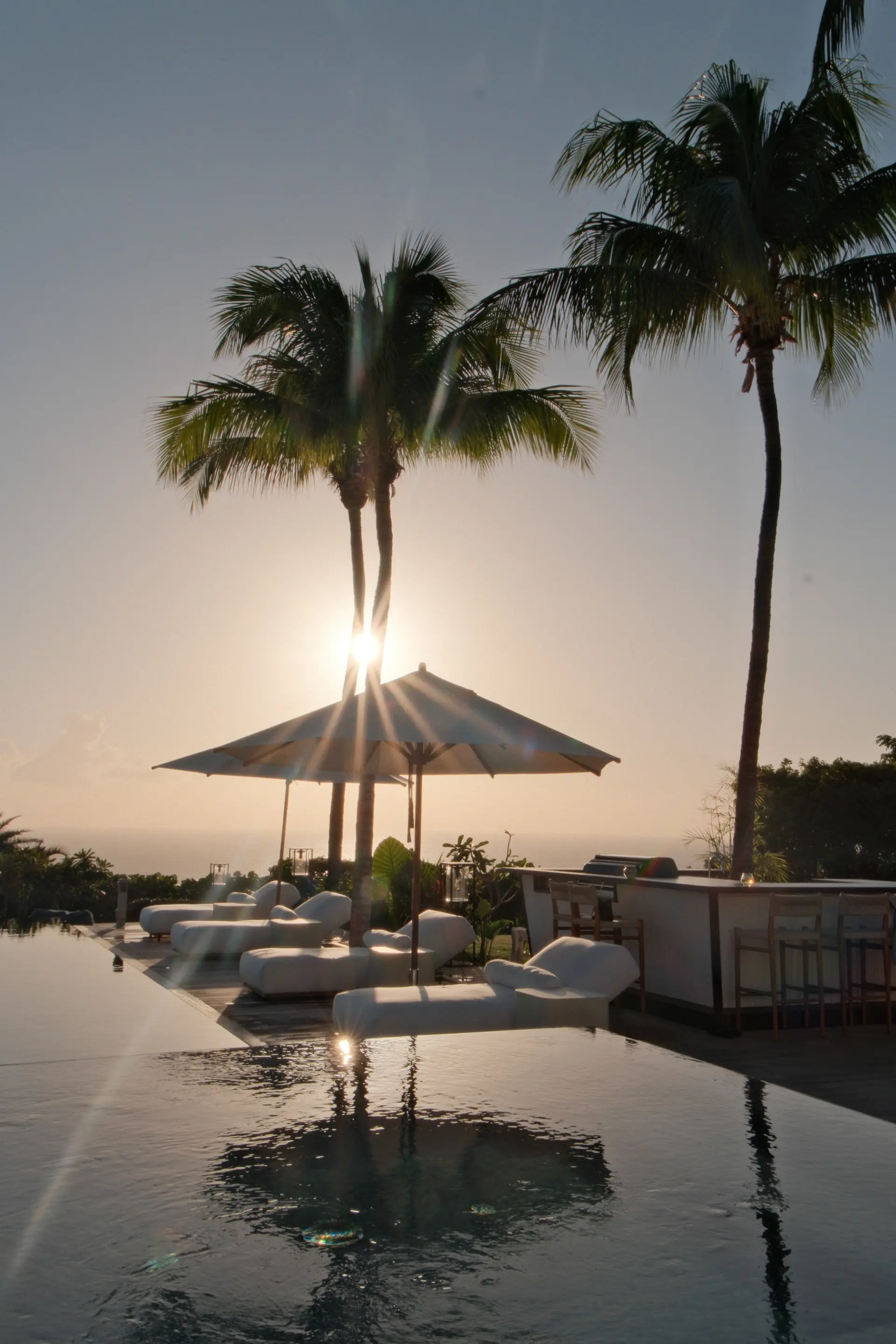 Maison Blanc Bleu pool terrace at sunset